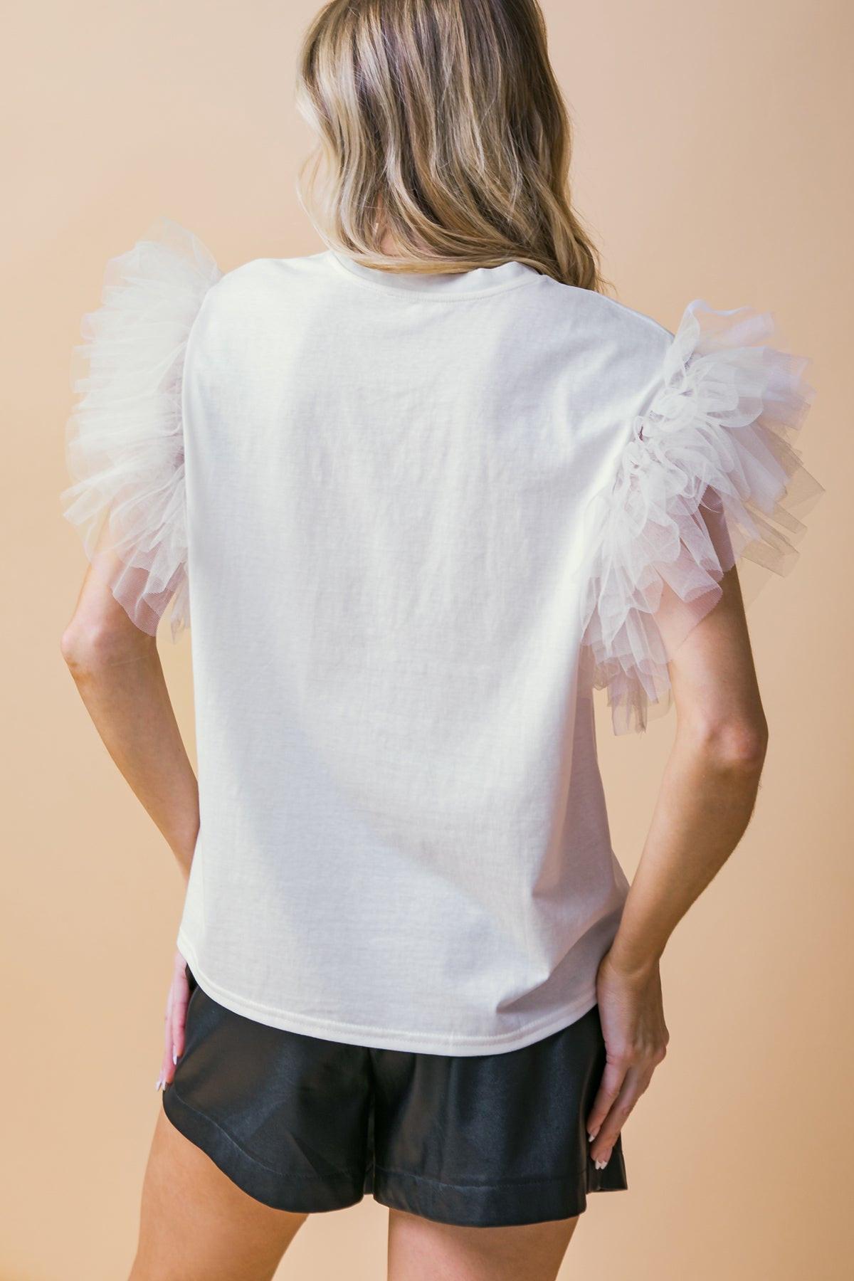 ICONIC BEAUTY KNIT TOP.