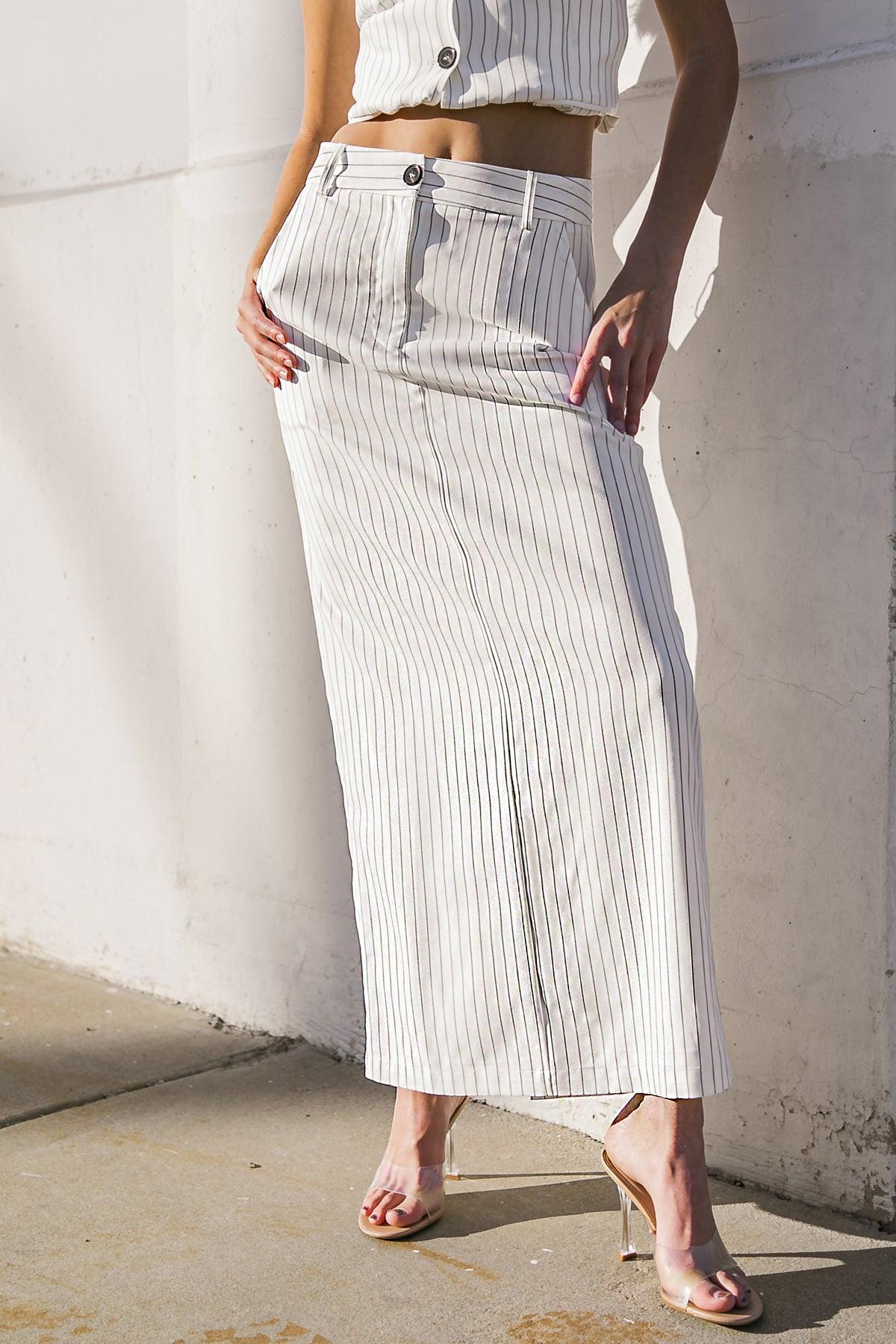 GET TO THE POINT WOVEN MIDI SKIRT.