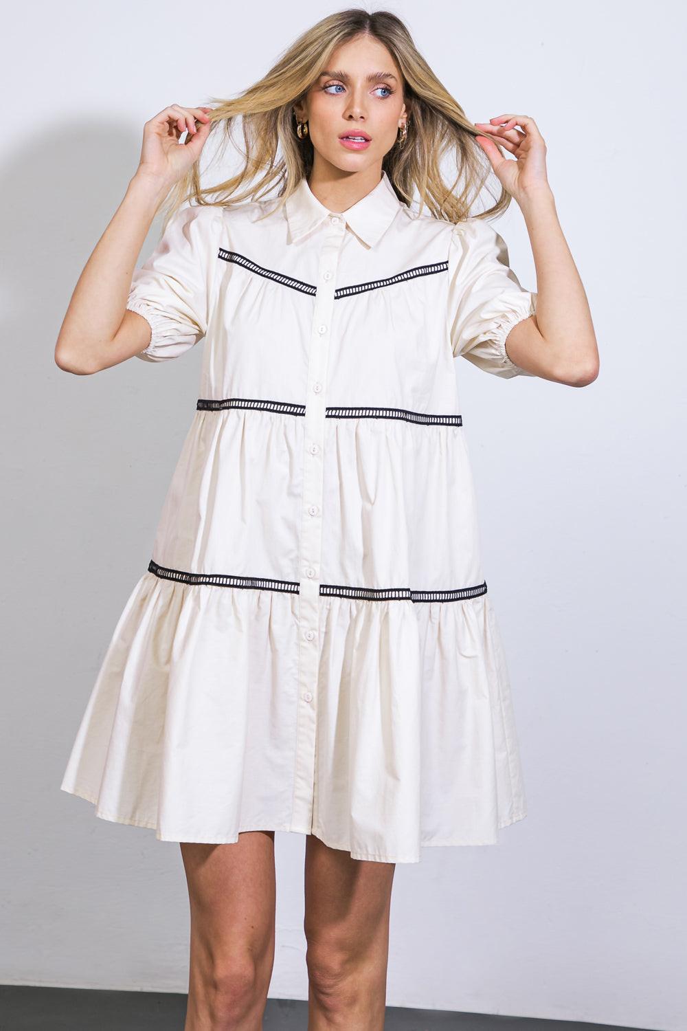 A WOW MOMENT WOVEN MINI DRESS.