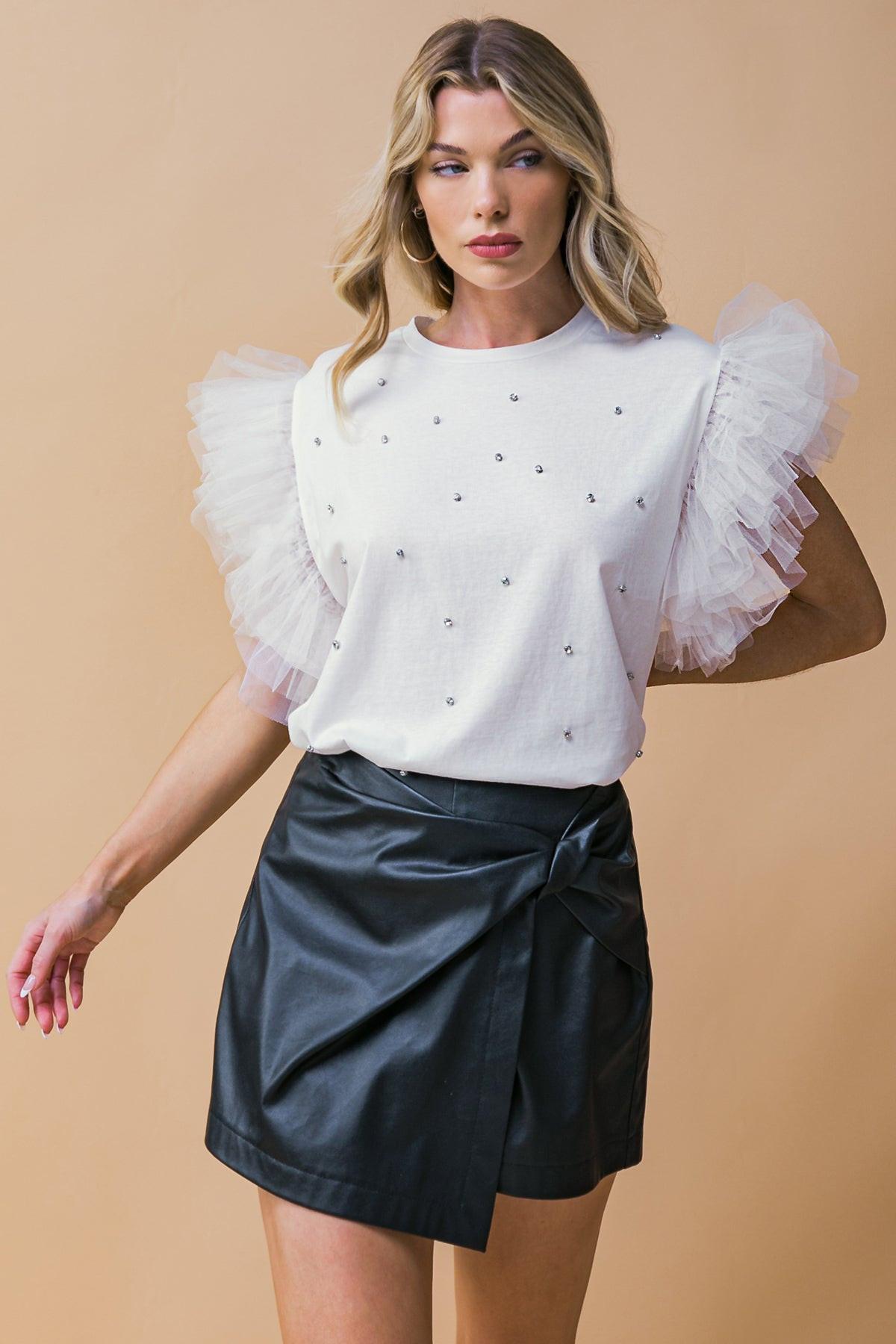ICONIC BEAUTY KNIT TOP.