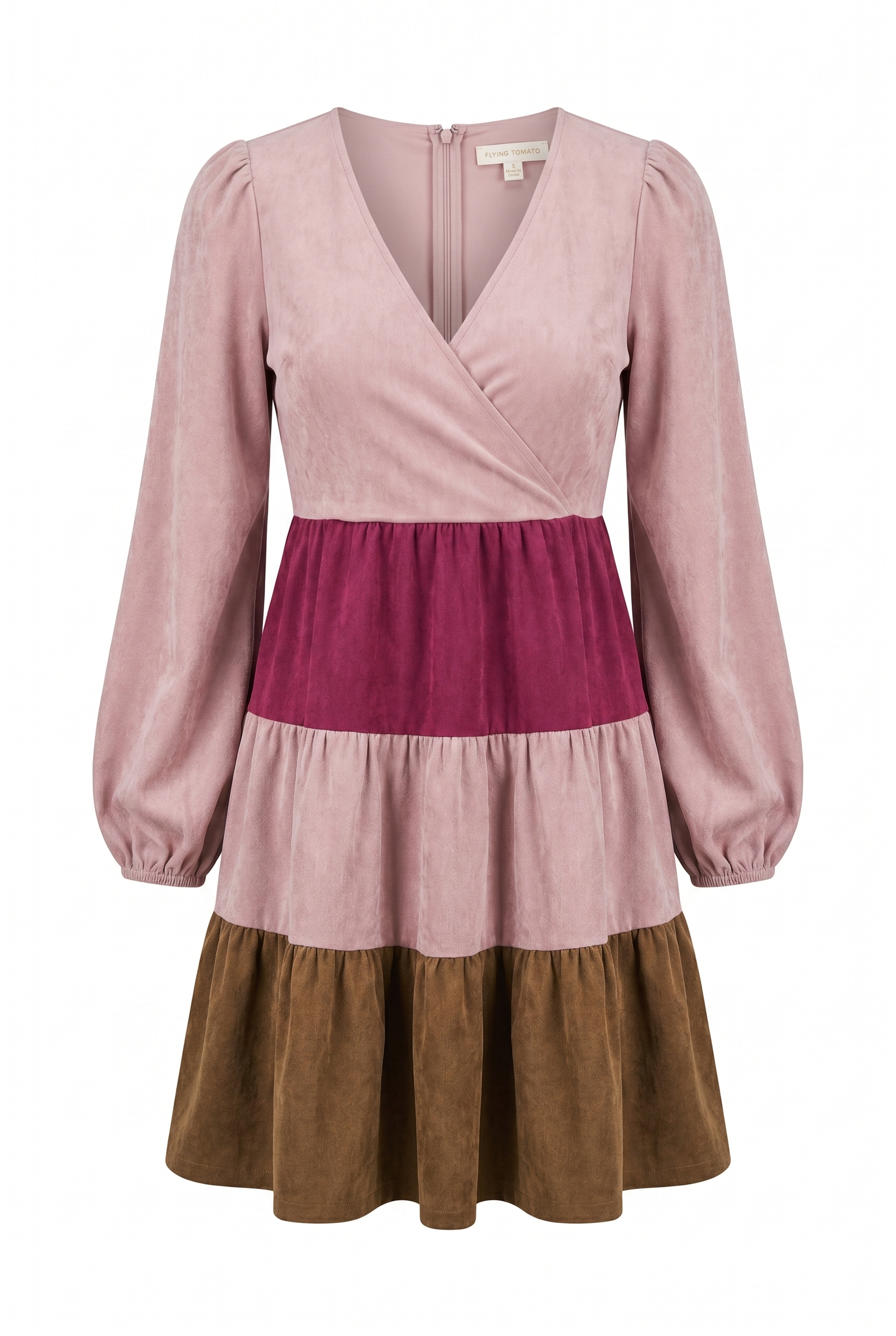 Brown, magenta, and blush faux suede dress features a color blocked design, surplice neckline, long sleeves, and a tiered bottom with back zipper closure | Flying Tomato