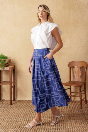 LEAVES OF TOMORROW WOVEN MIDI SKIRT.