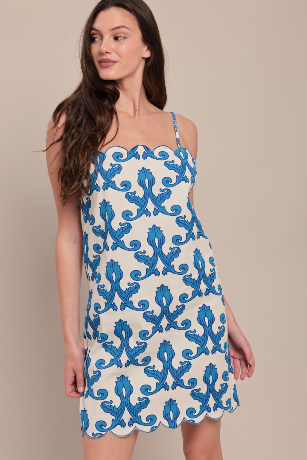 A printed woven mini dress featuring straight neckline, straps, scallop edge and back zipper closure

Details:

Self: 97% Cotton 3% Spandex

Size & Fit

-Model is 5`8" And Wearing Size Small
-Measurements Taken From Size Small
-Approx. Length: 35"