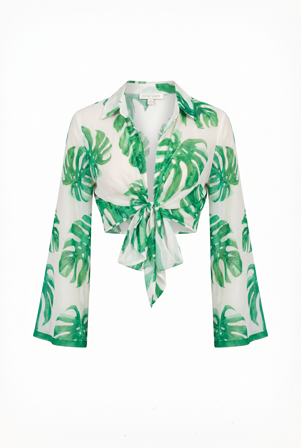 Green leaf-patterned shirt on a white background