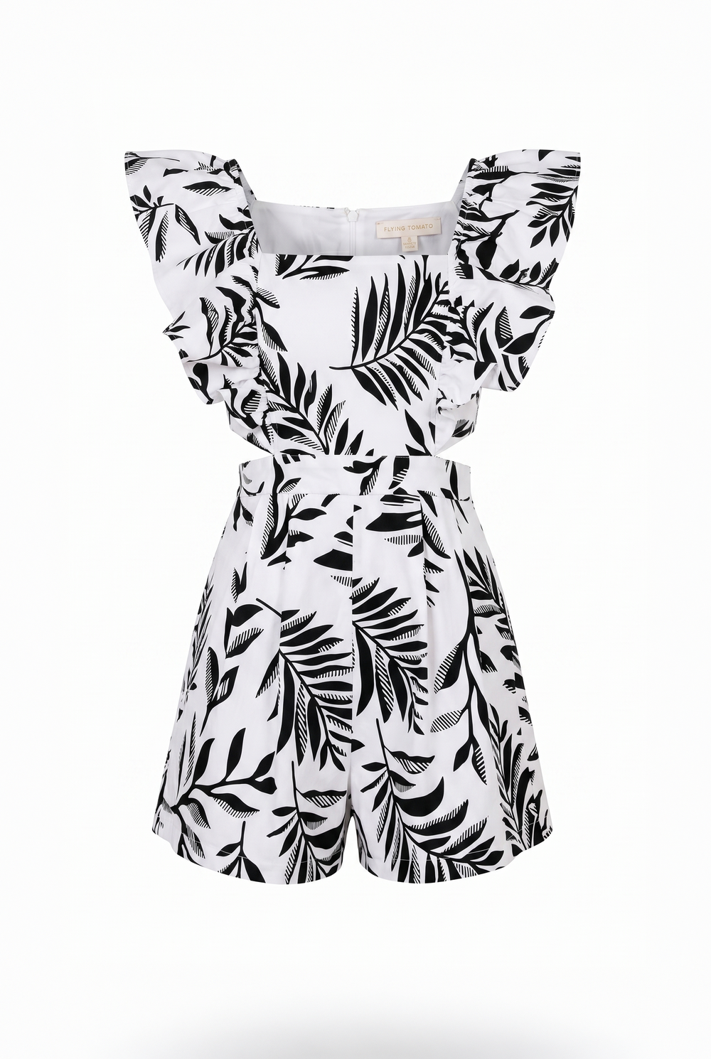 White romper with black leaf pattern on a white background