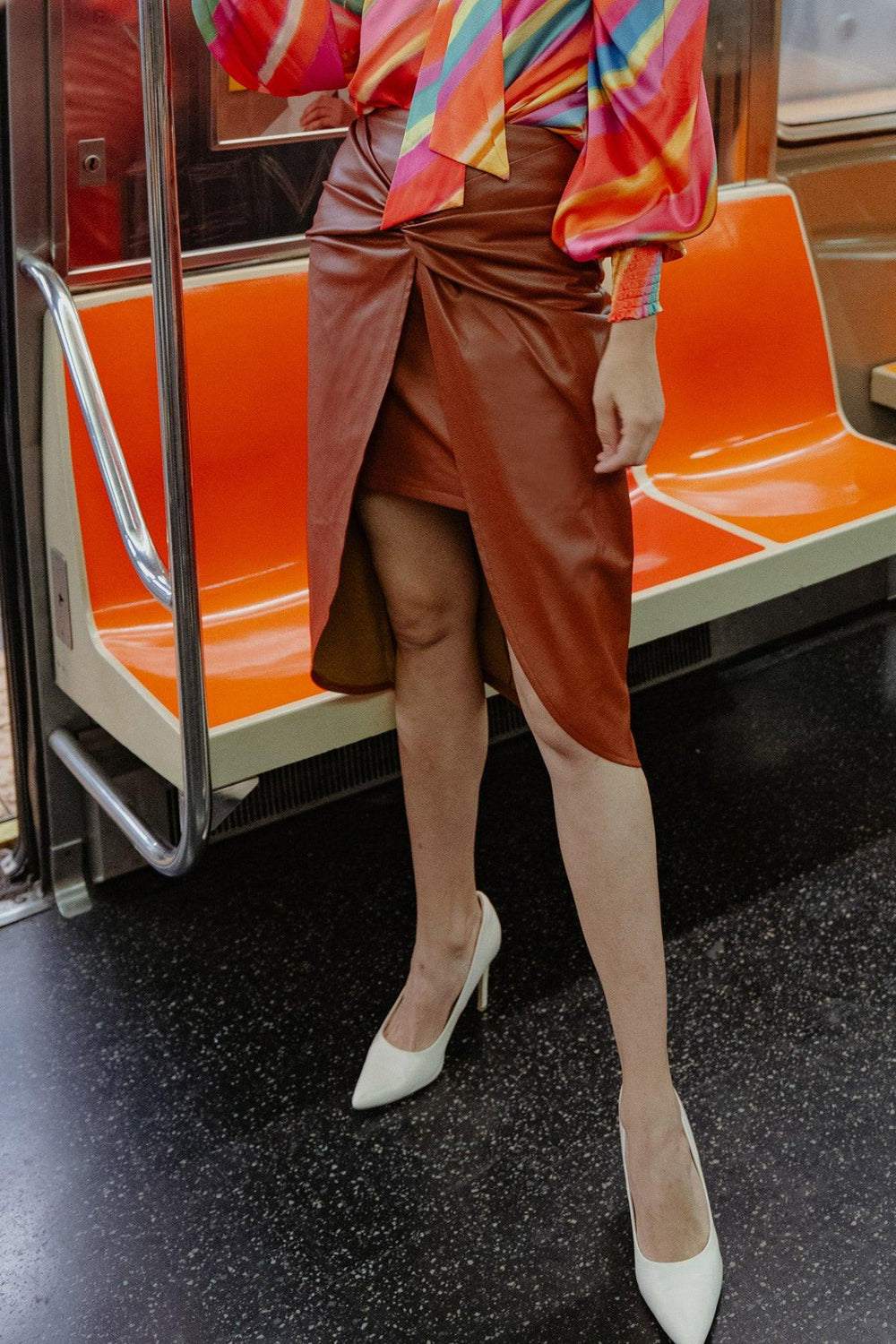 CHOOSE US LEATHER MIDI SKIRT.