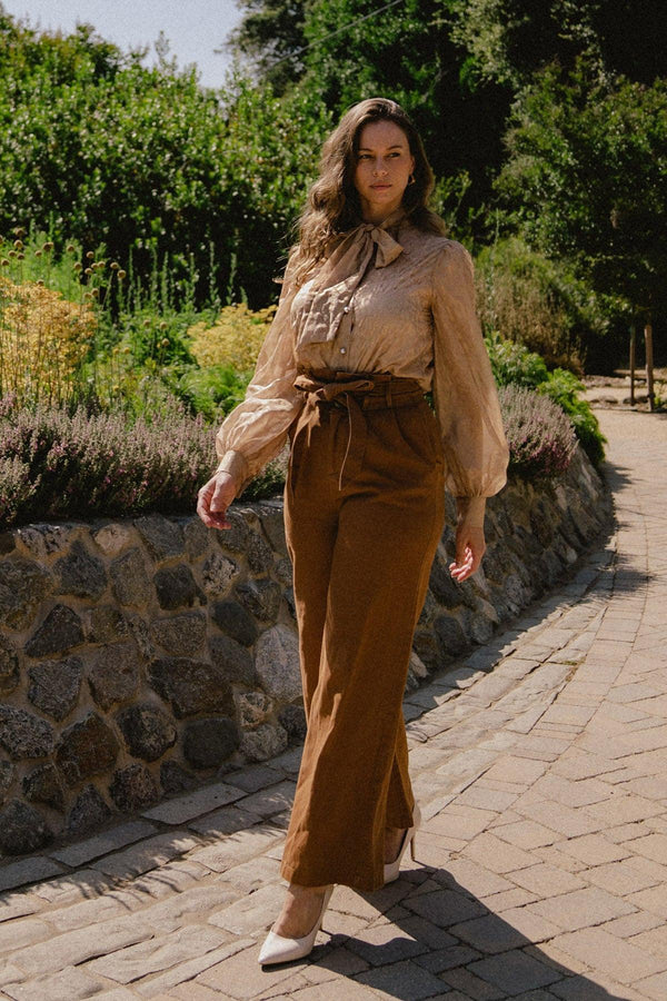 BEYOND COMPARE SEMI-SHEER TOP.