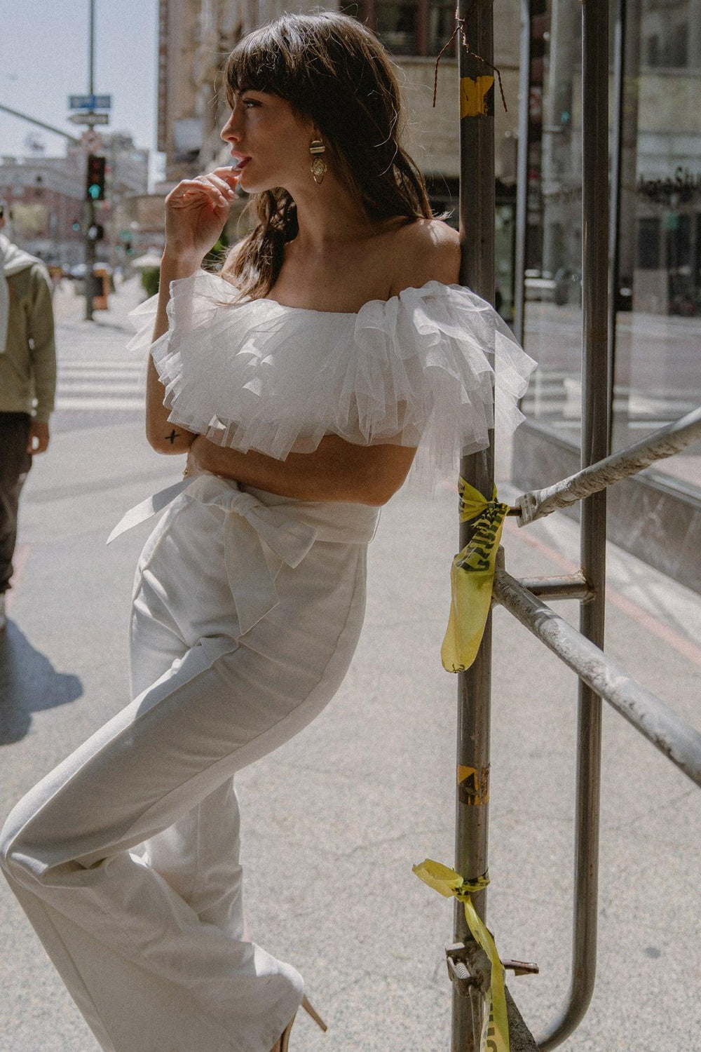 A POWER MOOD WHITE DENIM JUMPSUIT.