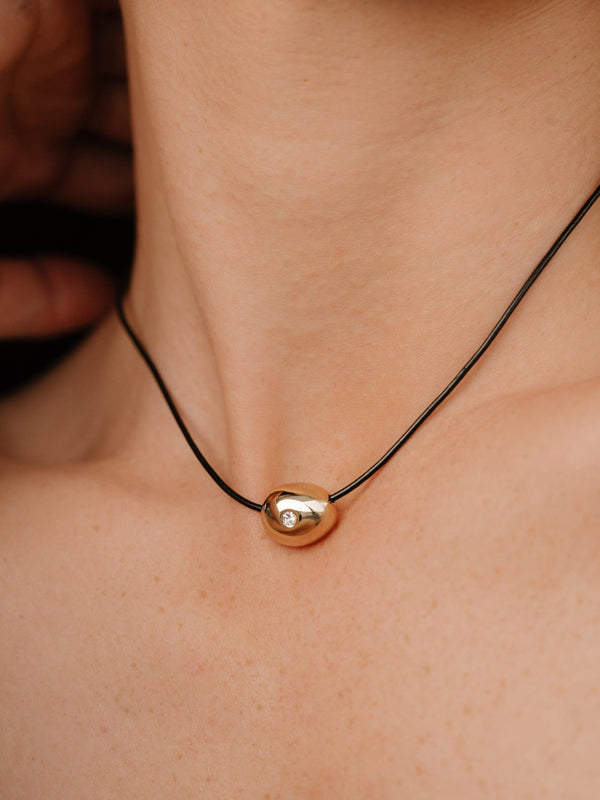 Polished Pebble Leather Pendant Necklace.