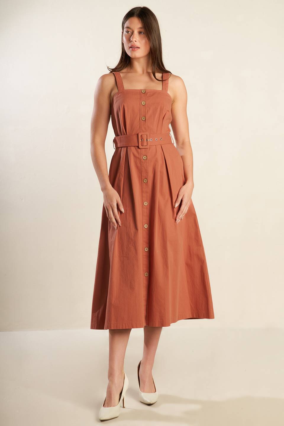 
A solid woven midi dress featuring straight neckline, strap, button down, self belt and full skirt

Details:

Self : 100% Cotton

Size &amp; Fit

- Model is 5`9" And Wearing Size Small
- Measurements Taken From Size Small
- Approx. Length: 52"