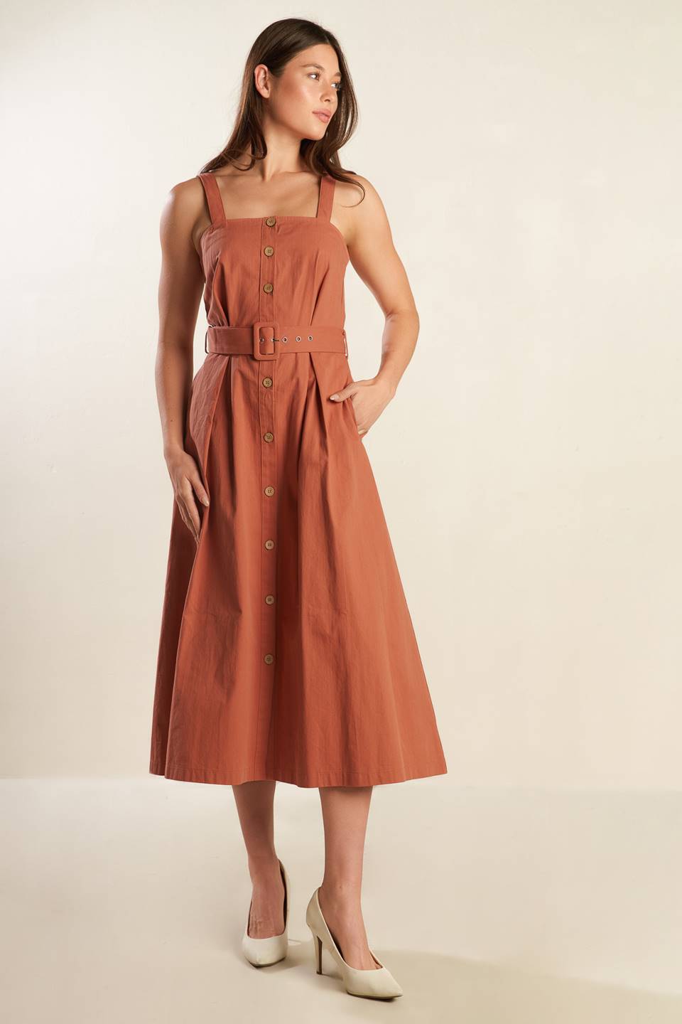 
A solid woven midi dress featuring straight neckline, strap, button down, self belt and full skirt

Details:

Self : 100% Cotton

Size &amp; Fit

- Model is 5`9" And Wearing Size Small
- Measurements Taken From Size Small
- Approx. Length: 52"