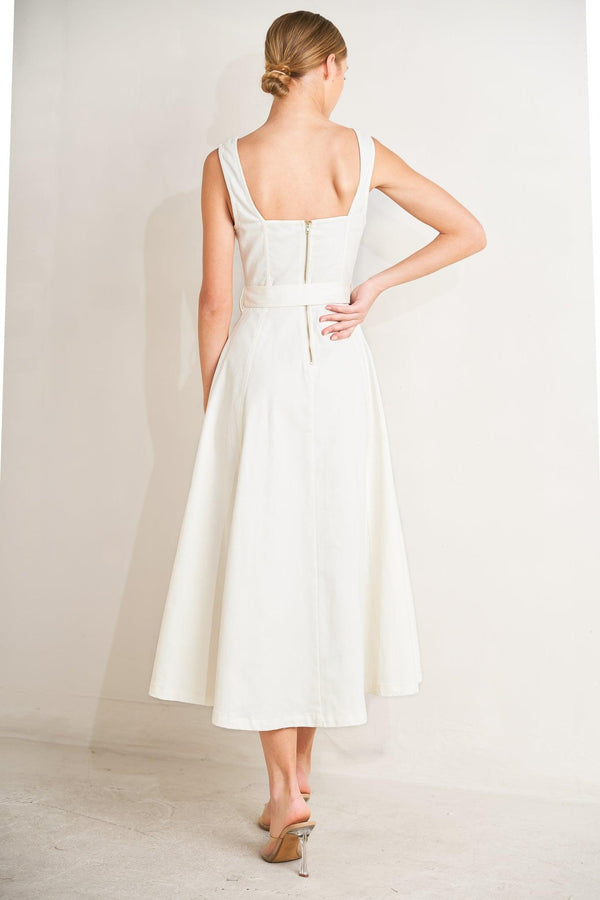 
A solid woven midi dress featuring sweetheart neckline, sleeveless, front button down, self belt and circle skirt

Details:

Self : 97% Cotton 3% Spandex

Size &amp; Fit

- Model is 5`8" And Wearing Size Small
- Measurements Taken From Size Small
- Approx. Length: 49"