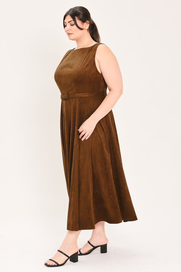 A woman wearing a sleeveless tobacco brown midi dress with a structured bodice, matching belt, and full skirt | FREEMARKET Curve