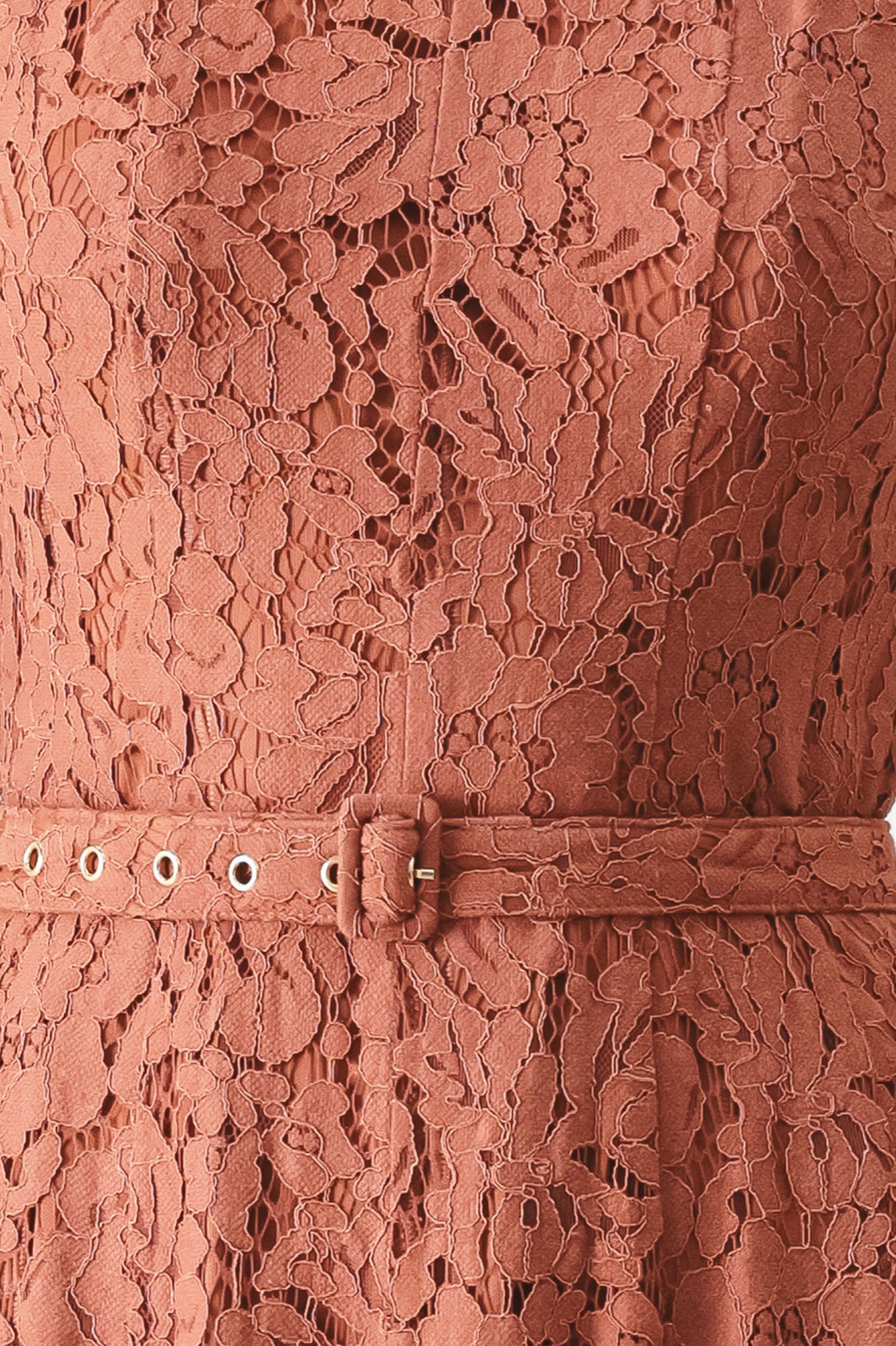 Close up of a rust colored lace midi dress featuring wide neckline, sleeveless, self belt, full circle skirt and back zipper closure | FREEMARKET