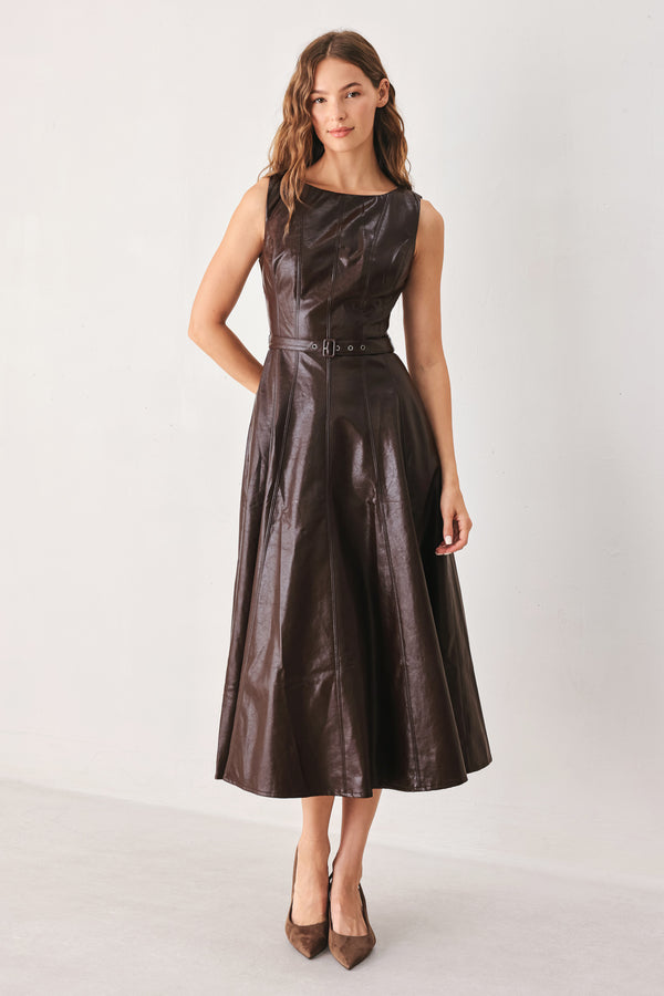 A woman wearing a sleeveless, dark brown faux-leather midi dress with a defined waist belt and a flared skirt | FREEMARKET