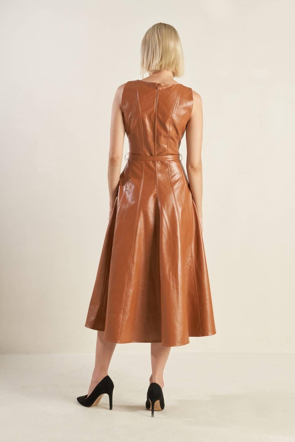 LUNAR SYMPHONY FAUX LEATHER MIDI DRESS.
