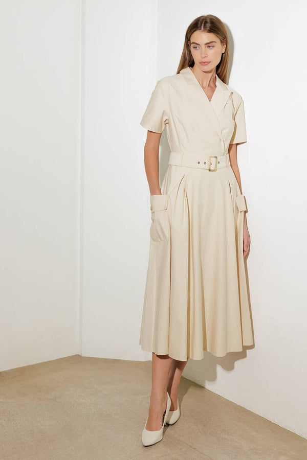 A solid woven midi dress featuring a surplice neckline with collar, short sleeve, self-belt, full skirt with side pocket, and full skirt

Details:

Self: 100% Cotton

Size &amp; Fit

- Model is 5`8" And Wearing Size Small
- Measurements Taken From Size Small
- Approx. Length: 52" FLYING TOMATO