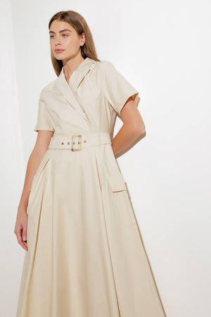 A solid woven midi dress featuring a surplice neckline with collar, short sleeve, self-belt, full skirt with side pocket, and full skirt

Details:

Self: 100% Cotton

Size &amp; Fit

- Model is 5`8" And Wearing Size Small
- Measurements Taken From Size Small
- Approx. Length: 52" FLYING TOMATO