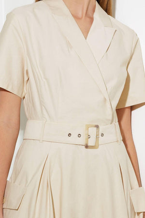 A solid woven midi dress featuring a surplice neckline with collar, short sleeve, self-belt, full skirt with side pocket, and full skirt

Details:

Self: 100% Cotton

Size &amp; Fit

- Model is 5`8" And Wearing Size Small
- Measurements Taken From Size Small
- Approx. Length: 52" FLYING TOMATO