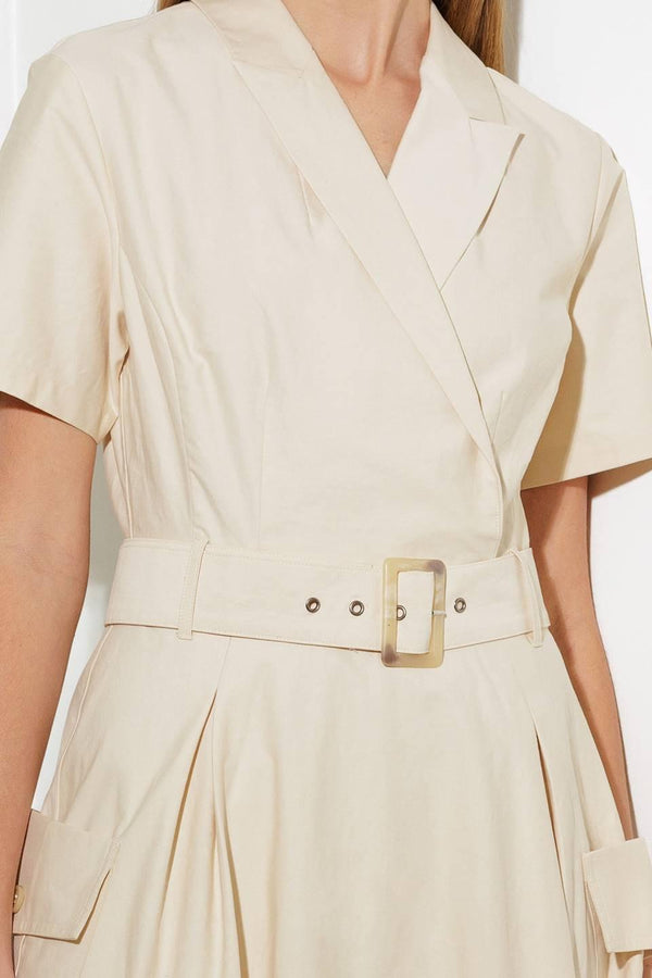 A solid woven midi dress featuring a surplice neckline with collar, short sleeve, self-belt, full skirt with side pocket, and full skirt

Details:

Self: 100% Cotton

Size &amp; Fit

- Model is 5`8" And Wearing Size Small
- Measurements Taken From Size Small
- Approx. Length: 52" FLYING TOMATO