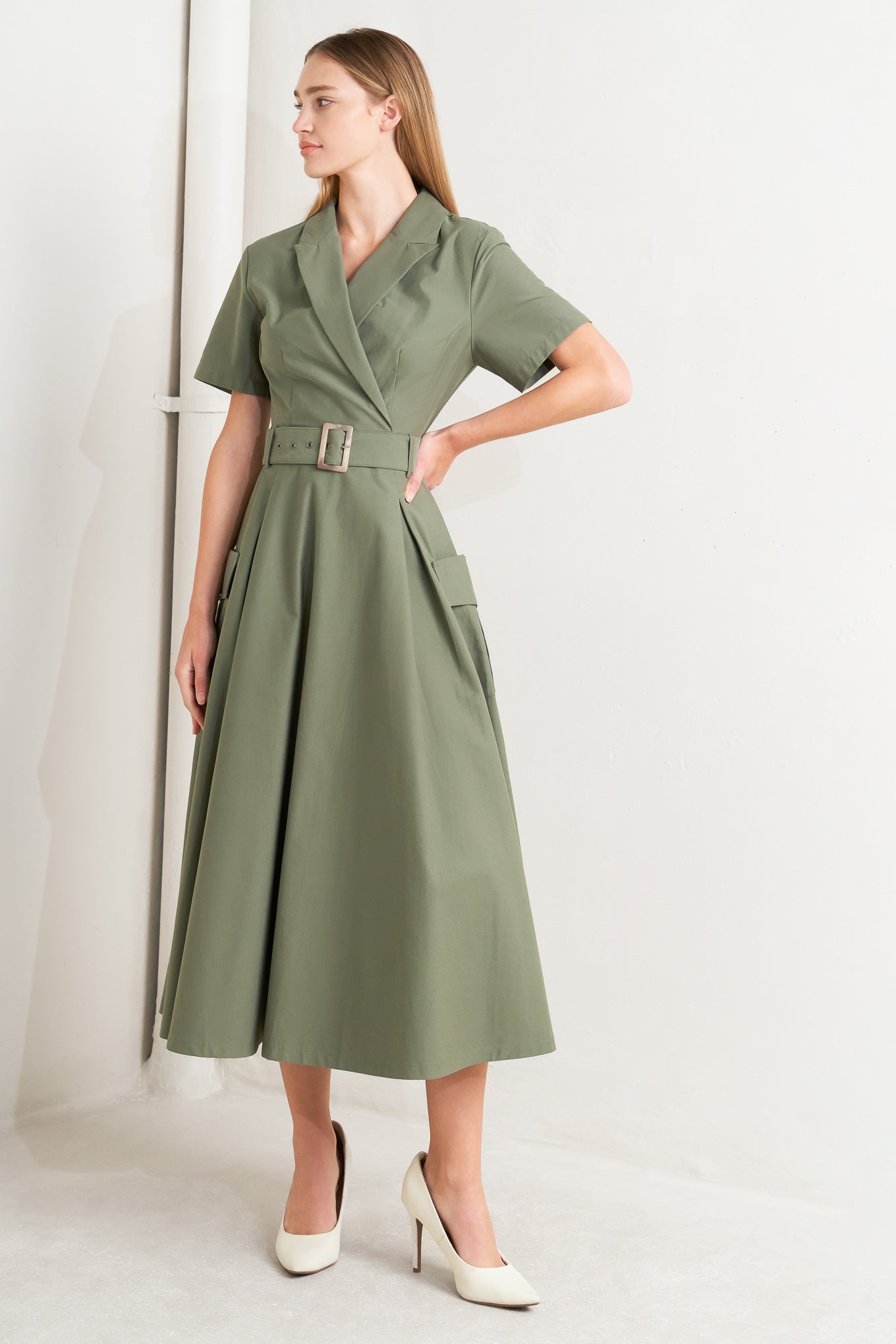A solid woven midi dress featuring a surplice neckline with collar, short sleeve, self-belt, full skirt with side pocket, and full skirt

Details:

Self: 100% Cotton

Size &amp; Fit

- Model is 5`8" And Wearing Size Small
- Measurements Taken From Size Small
- Approx. Length: 52" FLYING TOMATO
