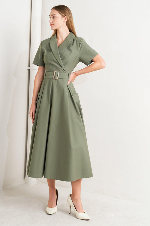 A solid woven midi dress featuring a surplice neckline with collar, short sleeve, self-belt, full skirt with side pocket, and full skirt

Details:

Self: 100% Cotton

Size &amp; Fit

- Model is 5`8" And Wearing Size Small
- Measurements Taken From Size Small
- Approx. Length: 52" FLYING TOMATO