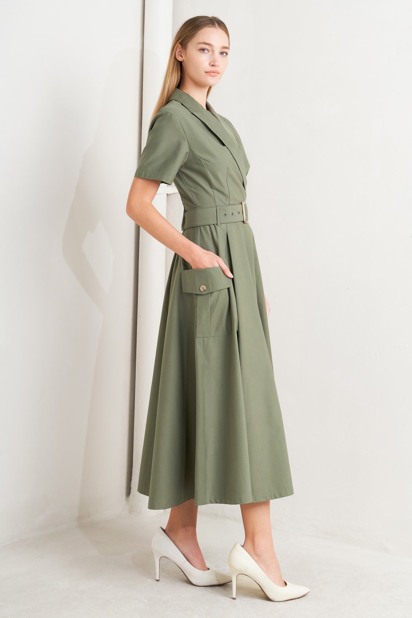 A solid woven midi dress featuring a surplice neckline with collar, short sleeve, self-belt, full skirt with side pocket, and full skirt

Details:

Self: 100% Cotton

Size &amp; Fit

- Model is 5`8" And Wearing Size Small
- Measurements Taken From Size Small
- Approx. Length: 52" FLYING TOMATO