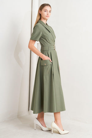 A solid woven midi dress featuring a surplice neckline with collar, short sleeve, self-belt, full skirt with side pocket, and full skirt

Details:

Self: 100% Cotton

Size &amp; Fit

- Model is 5`8" And Wearing Size Small
- Measurements Taken From Size Small
- Approx. Length: 52" FLYING TOMATO