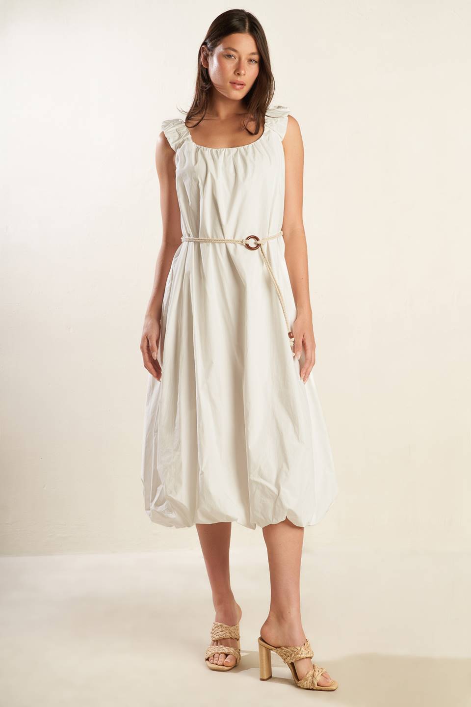 A solid off-white woven midi dress featuring U neckline, ruched shoulder strap, contrasting belt and bubble hemline.