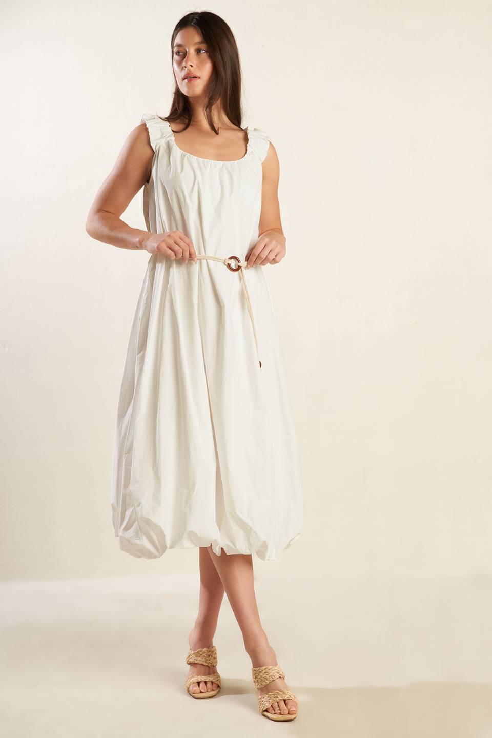 A solid off-white woven midi dress featuring U neckline, ruched shoulder strap, contrasting belt and bubble hemline.