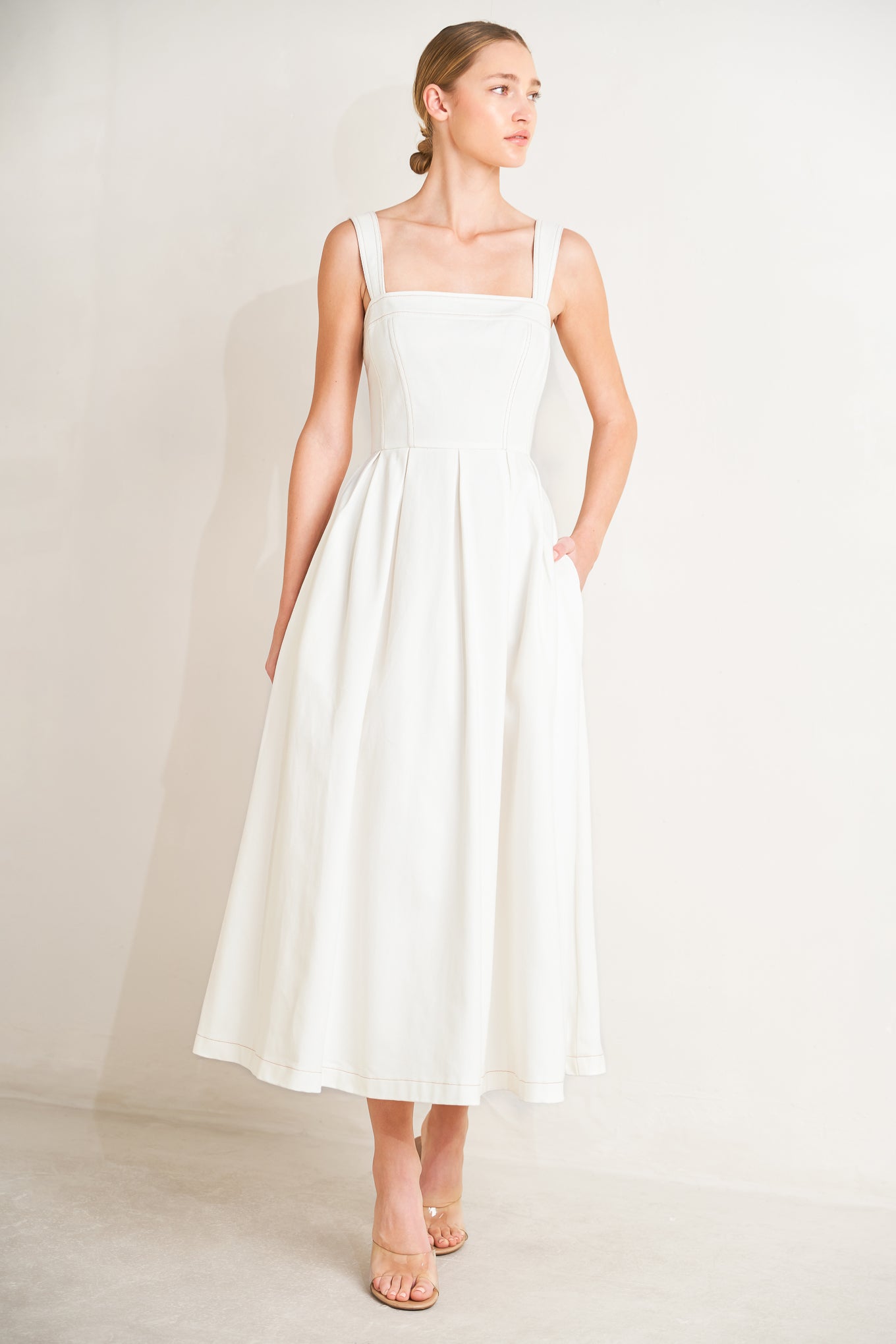 
A solid woven midi dress featuring straight neckline, straps, full skirt and back zipper closure

Details:

Self : 100% Cotton

Size &amp; Fit

- Model is 5`8" And Wearing Size Small
- Measurements Taken From Size Small
- Approx. Length: 50"