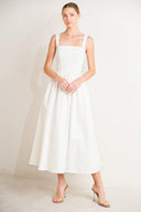 
A solid woven midi dress featuring straight neckline, straps, full skirt and back zipper closure

Details:

Self : 100% Cotton

Size &amp; Fit

- Model is 5`8" And Wearing Size Small
- Measurements Taken From Size Small
- Approx. Length: 50"