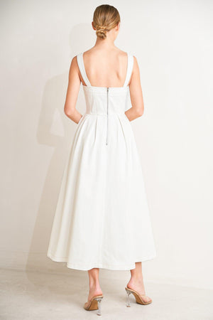 
A solid woven midi dress featuring straight neckline, straps, full skirt and back zipper closure

Details:

Self : 100% Cotton

Size &amp; Fit

- Model is 5`8" And Wearing Size Small
- Measurements Taken From Size Small
- Approx. Length: 50"