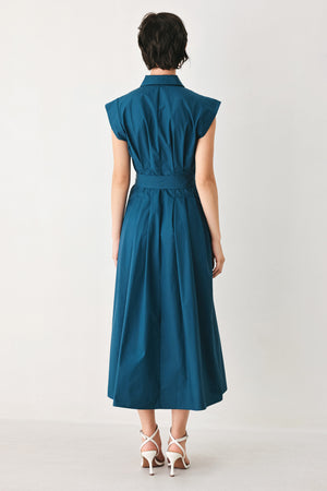 Woman wearing a teal midi dress featuring collar, short sleeve, front zipper closure and self sash tie | FREEMARKET