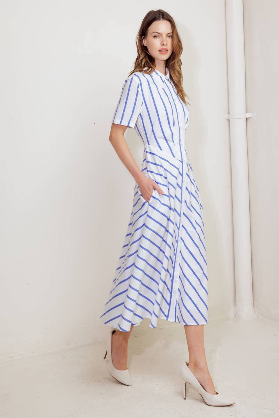 A striped woven midi dress featuring collar, short sleeve, button down and circle skirt