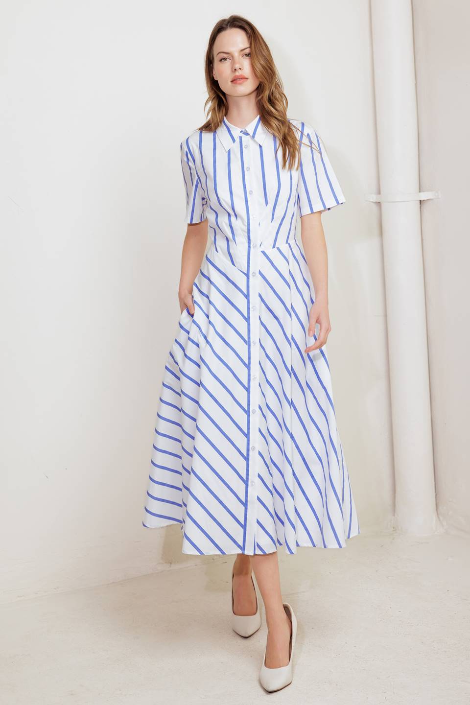 A striped woven midi dress featuring collar, short sleeve, button down and circle skirt