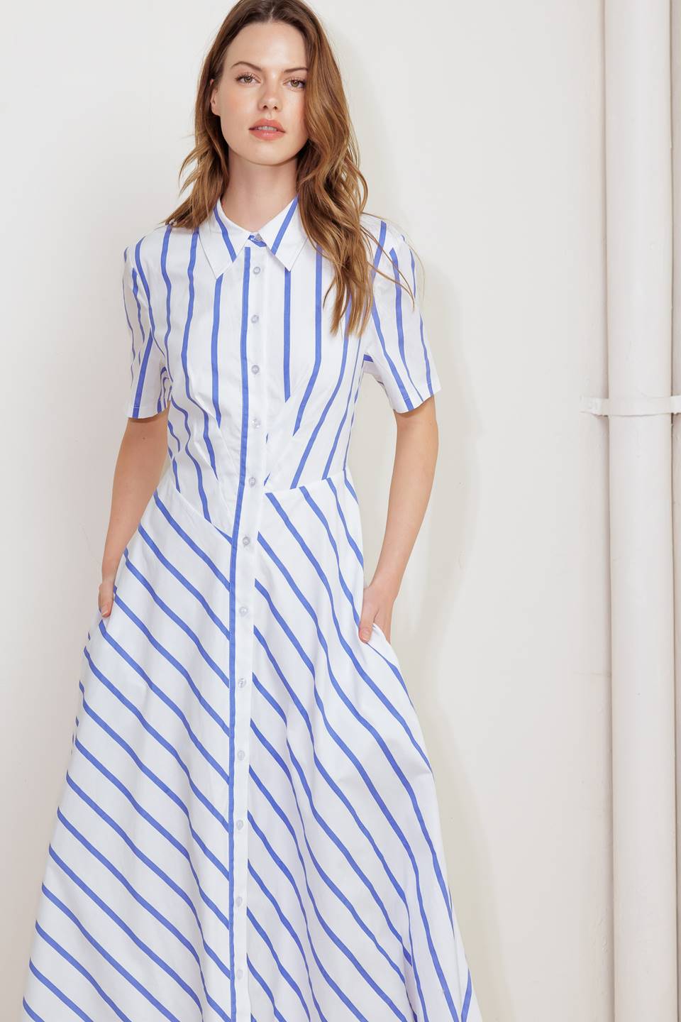 A striped woven midi dress featuring collar, short sleeve, button down and circle skirt