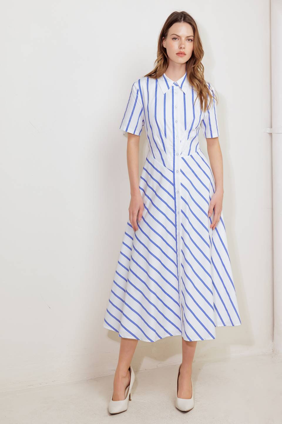 A striped woven midi dress featuring collar, short sleeve, button down and circle skirt