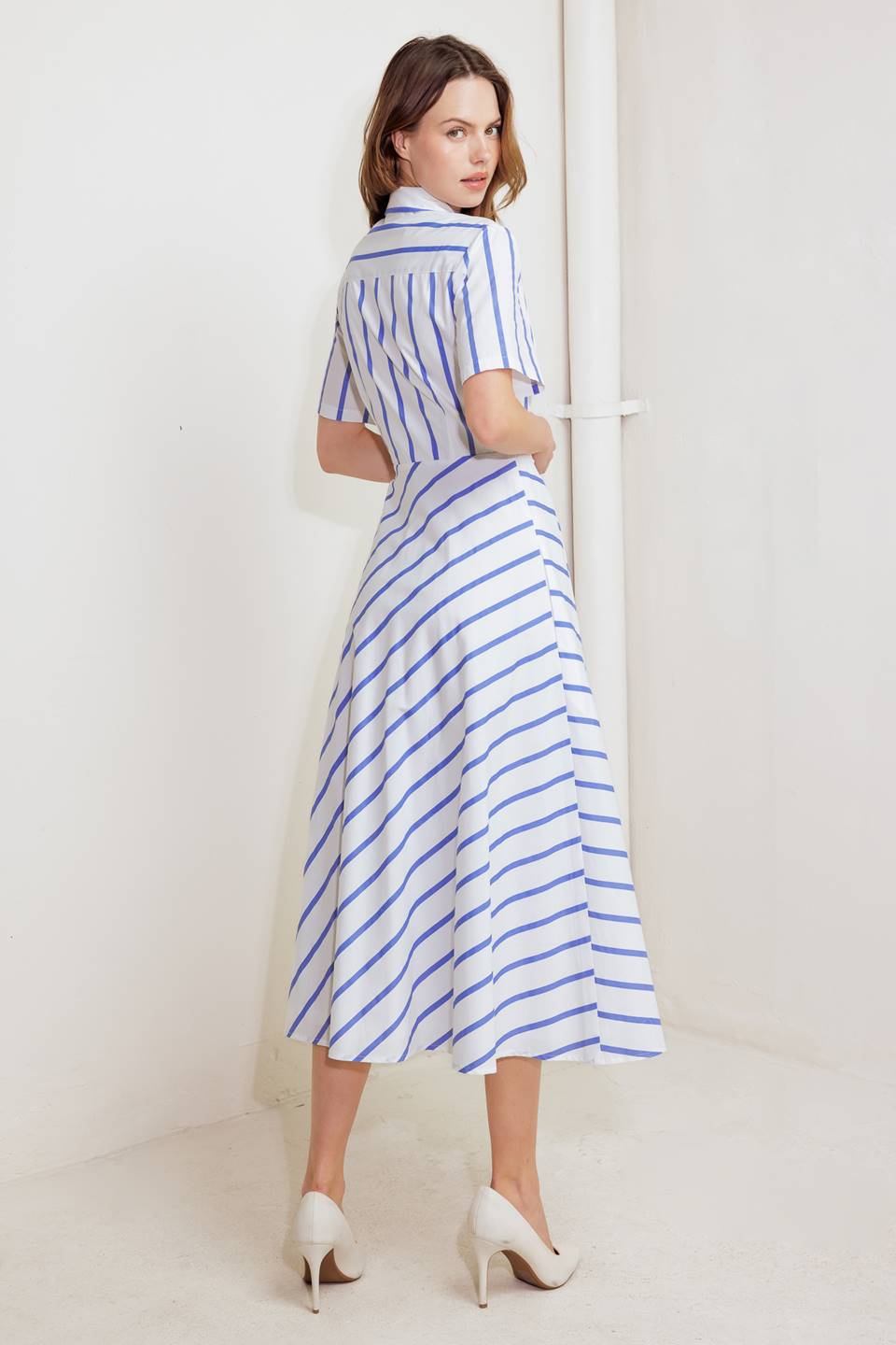 A striped woven midi dress featuring collar, short sleeve, button down and circle skirt