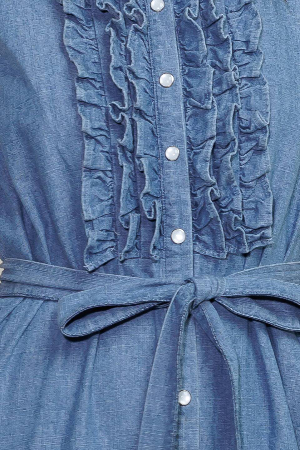 A washed denim midi dress featuring collar, snap button down, ruffled front, sleeveless, self sash tie and tiered skirt