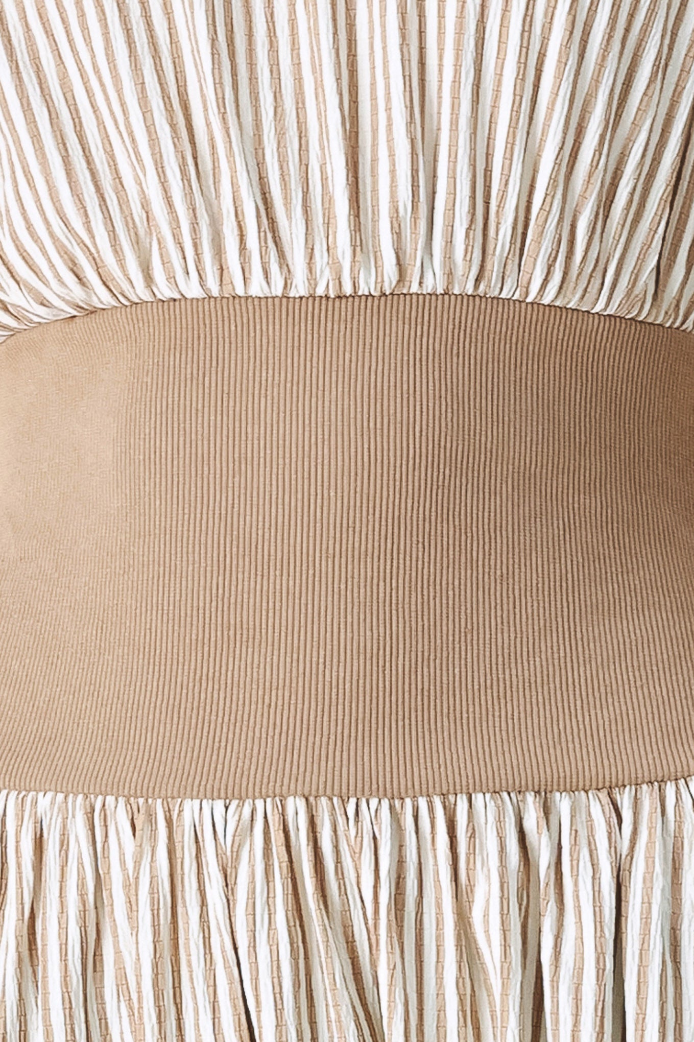 Woman wearing a beige mocha and white cream striped midi dress midi dress featuring wide neckline, cap sleeve, wide ribbed knit waist, full skirt and back zipper | FREEMARKET