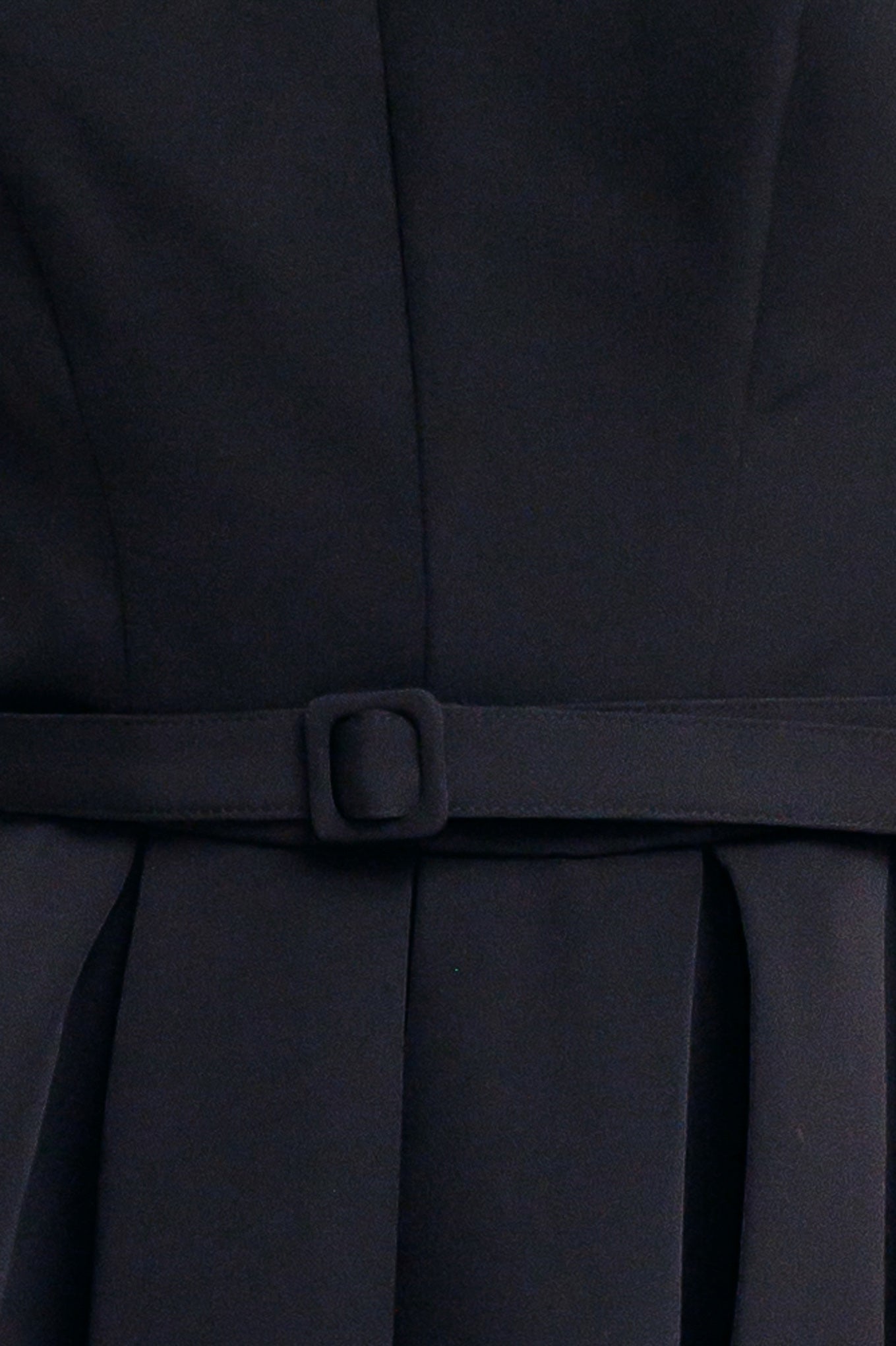 A solid woven midi dress featuring strapless straight neckline, self belt, full skirt and back zipper closure