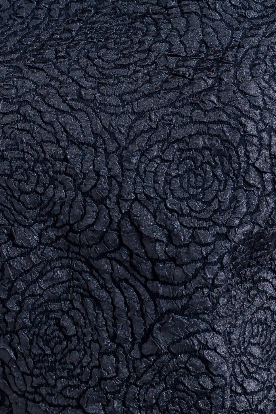 A texture woven midi dress featuring wide neckline, sleeveless with ruffled edge, self belt, full skirt low back with zipper closure