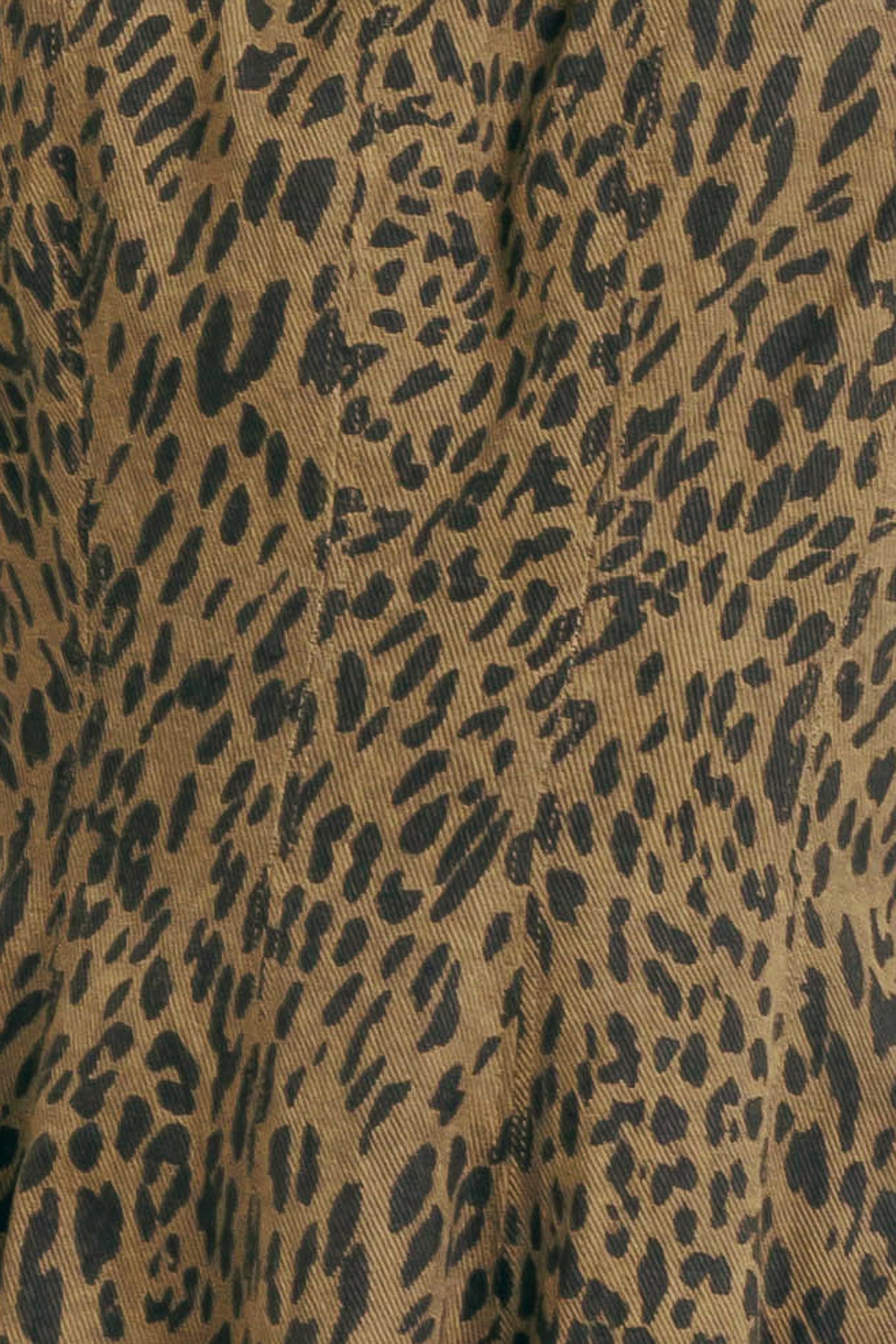 A printed woven mini dress featuring round neckline, sleeveless, circle skirt and back zipper closure