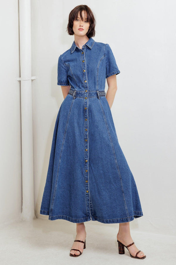 A washed denim midi dress featuring collar, short sleeve, button down, braided waistband and circle skirt