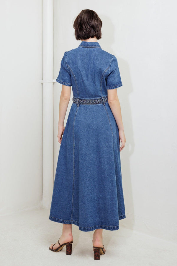 A washed denim midi dress featuring collar, short sleeve, button down, braided waistband and circle skirt