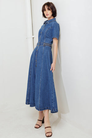 A washed denim midi dress featuring collar, short sleeve, button down, braided waistband and circle skirt