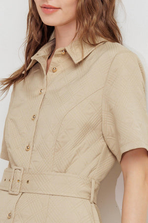 A textured woven midi dress featuring collar, short sleeve, button down, self belt and circle skirt