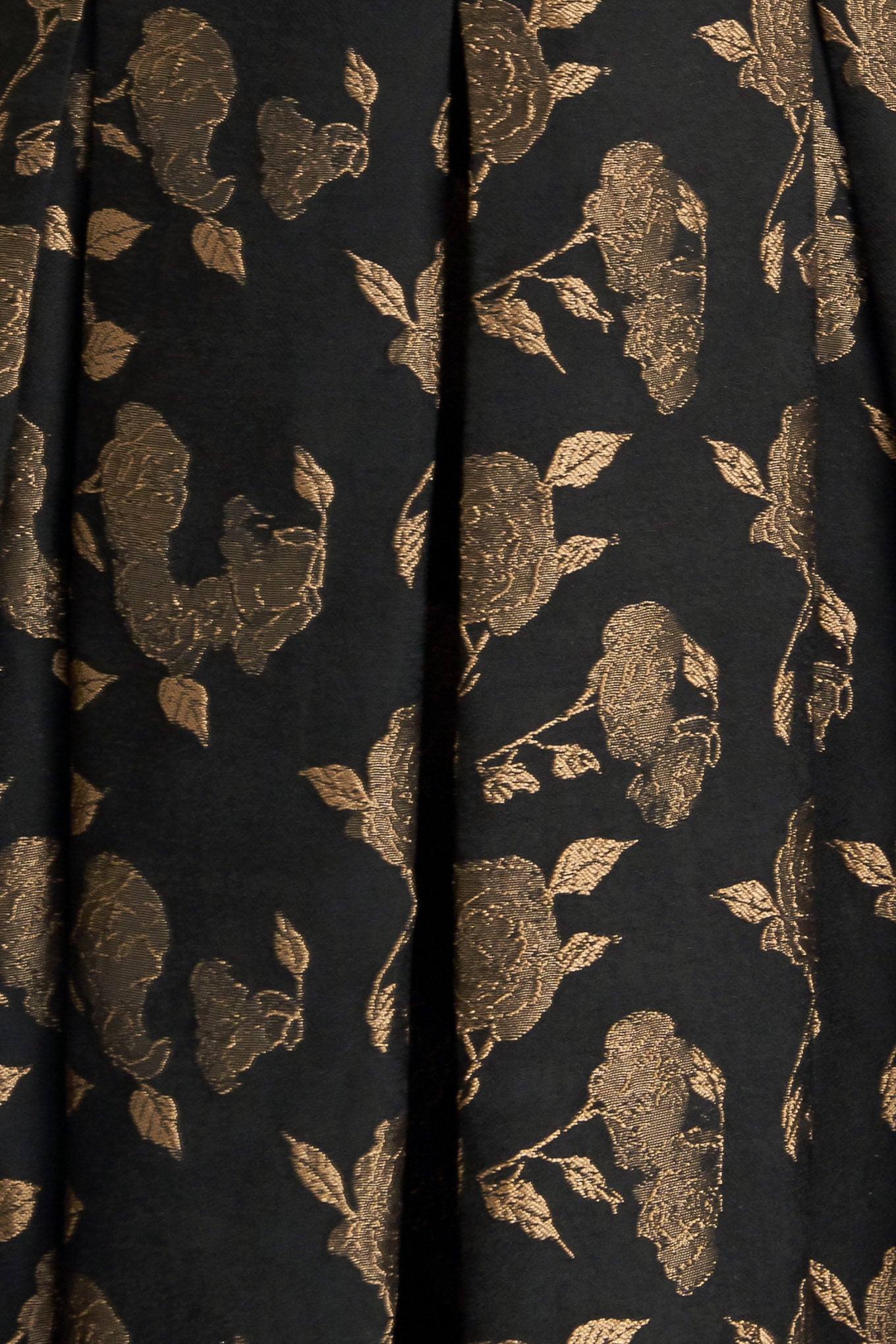 A jacquard woven midi dress featuring cami bodice, straps, self belt, full skirt and back zipper closure