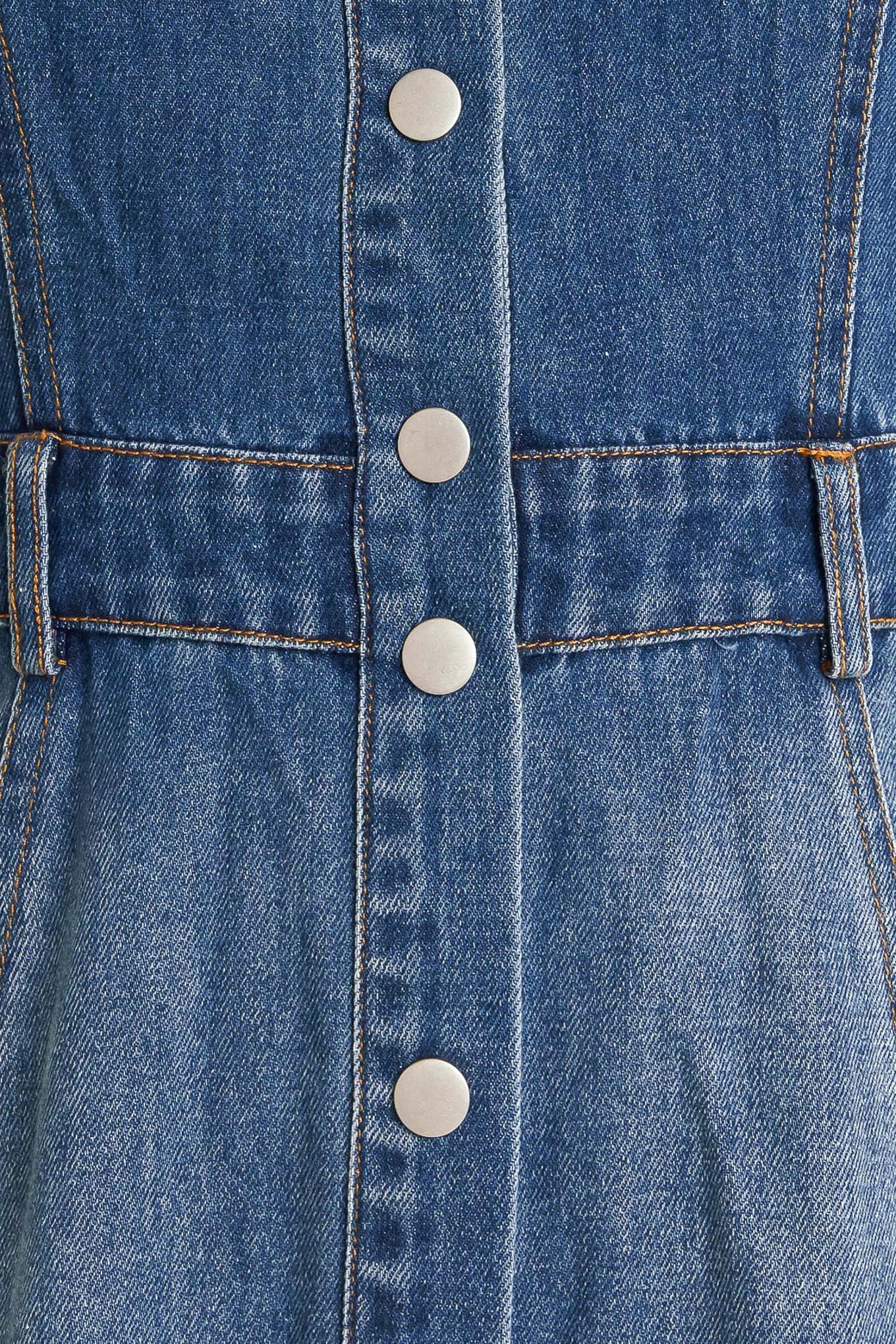 A washed denim midi dress featuring collar, snap button down, short sleeve and circle skirt